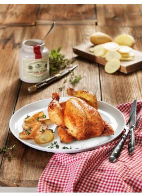 halbes-poulet-bratkartoffeln-auf-teller